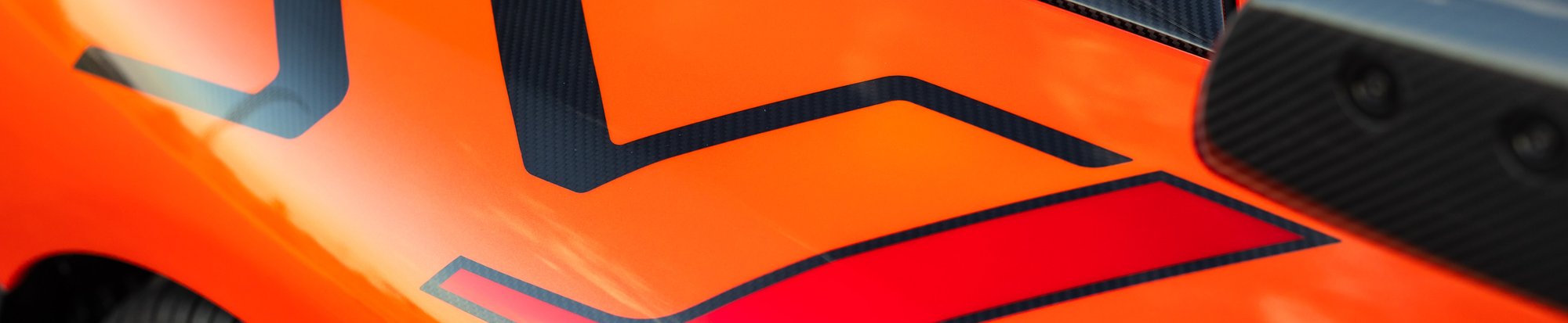 a close-up shot of decals on a sports car