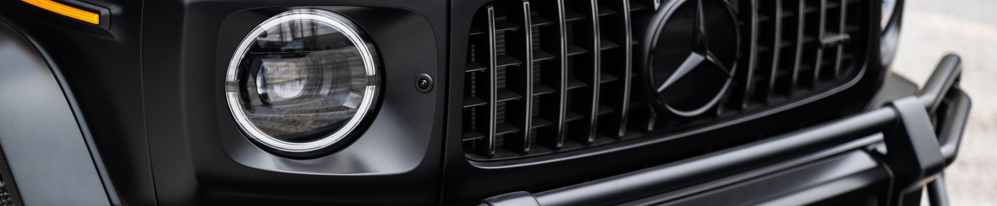 a close-up shot of the bumper of a Mercedes SUV